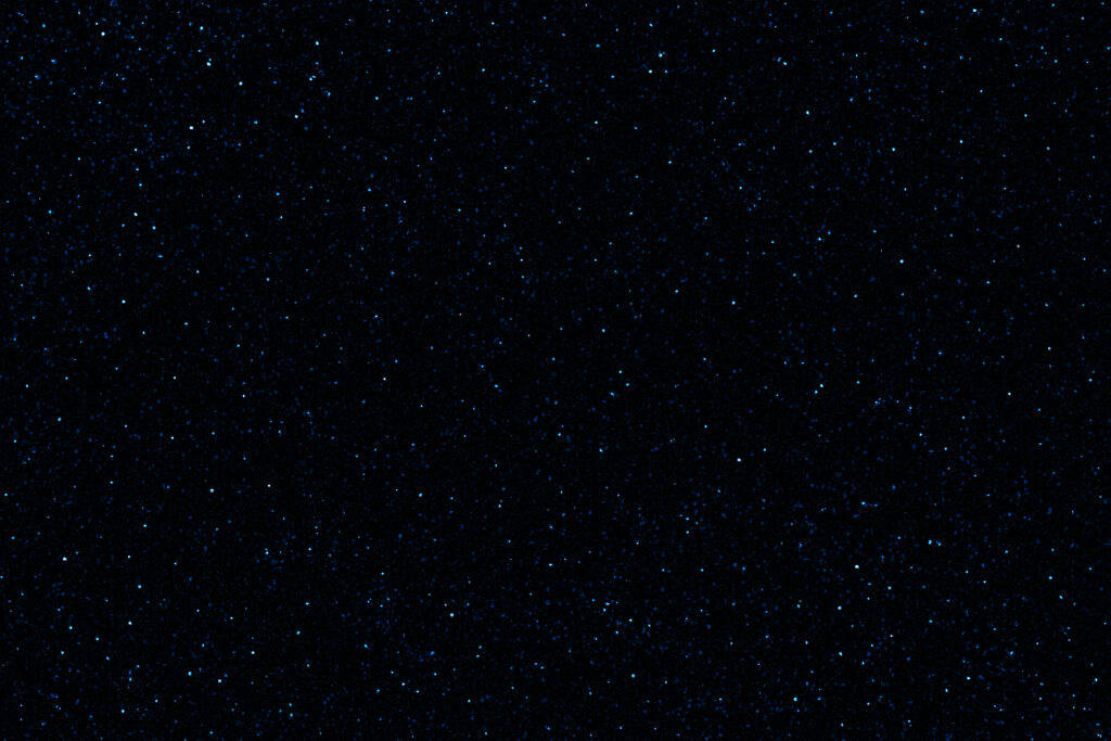 Galaxy space background. Dark blue night sky with stars. Glowing stars in space.